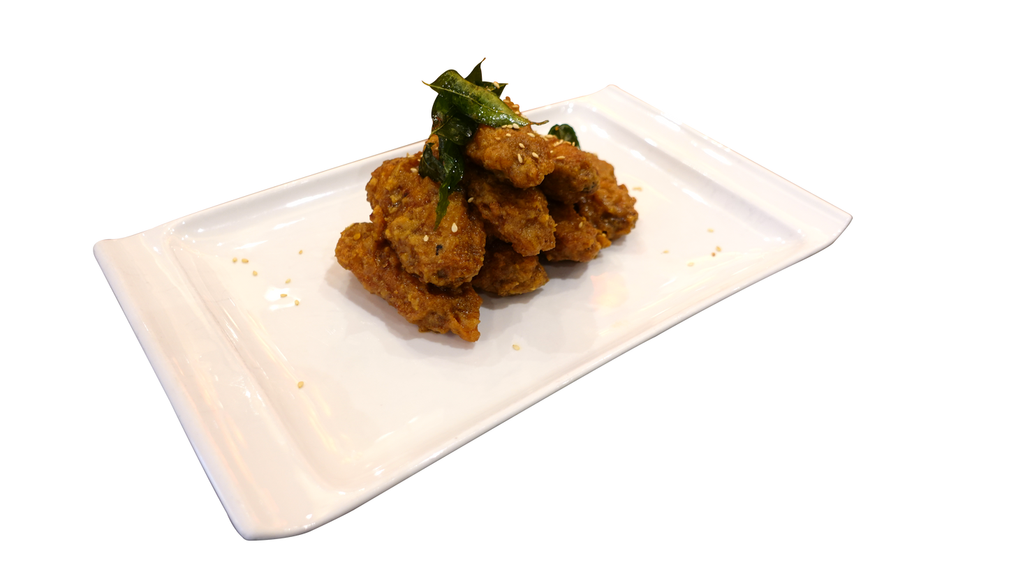 Crispy Chicken Wings Tossed with Salted Egg Yolk and Butter Cream Sauce 奶油咸香鸡中翅