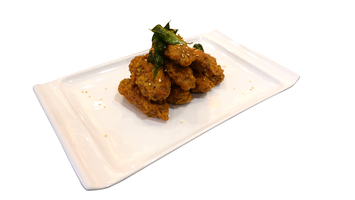 Crispy Chicken Wings Tossed with Salted Egg Yolk and Butter Cream Sauce  奶油咸香鸡中翅